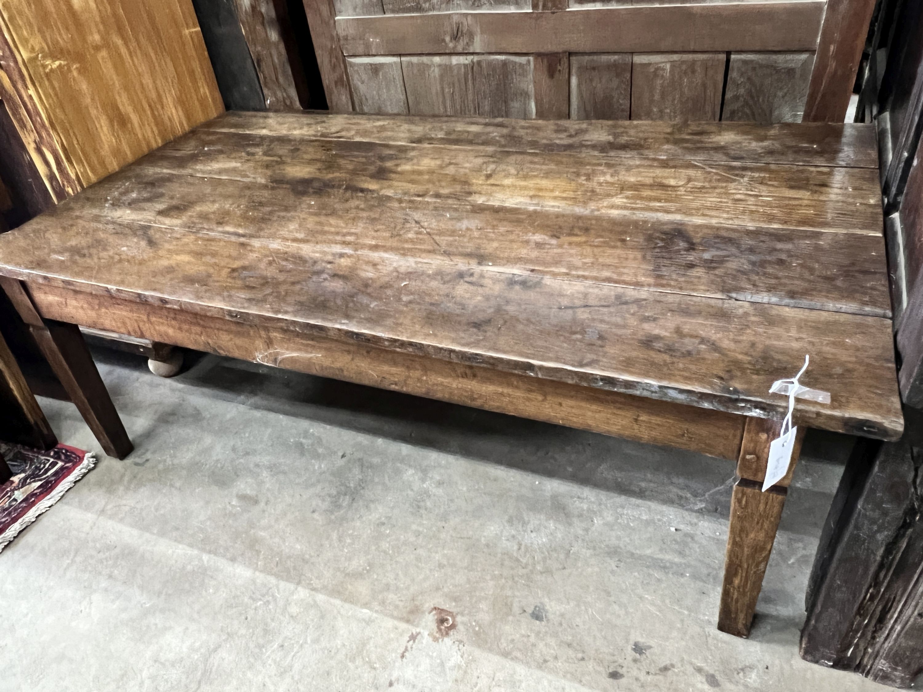 A 19th century French rectangular oak coffee table, length 134cm, depth 76cm, height 48cm (cut down dining table)